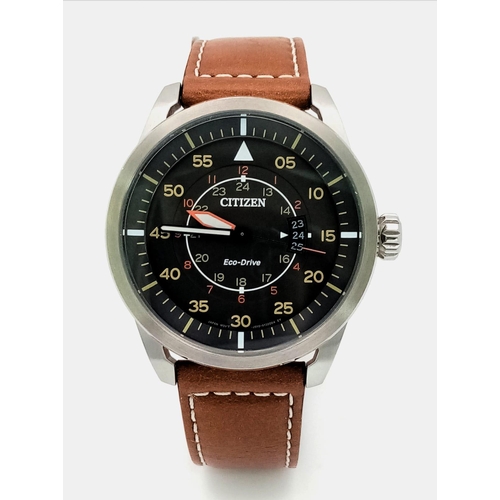 379 - A Citizen Eco Drive Gents Watch. Brown leather citizen strap. Stainless steel case - 45mm. Black dia... 