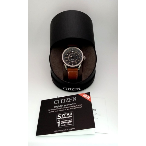 379 - A Citizen Eco Drive Gents Watch. Brown leather citizen strap. Stainless steel case - 45mm. Black dia... 