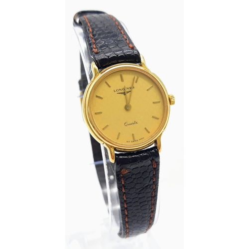 1634 - A Classic Longine Quartz Ladies Watch. Leather strap. Gilded case - 23mm. Gold tone dial. In good co... 