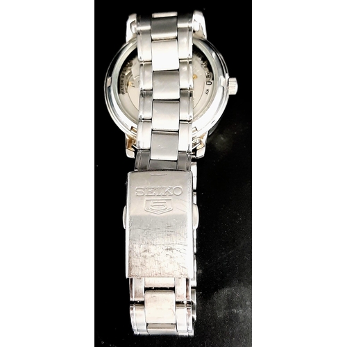 1640 - A Seiko Automatic 21 Jewels Skeleton Back, Stainless Steel, Water Resistant Bracelet Watch. a/f