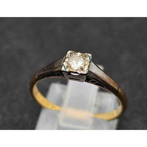 1649 - An 18K yellow gold solitaire diamond ring. Size N1/2, weight 2.5g.