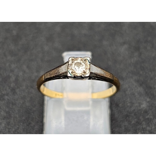 1649 - An 18K yellow gold solitaire diamond ring. Size N1/2, weight 2.5g.