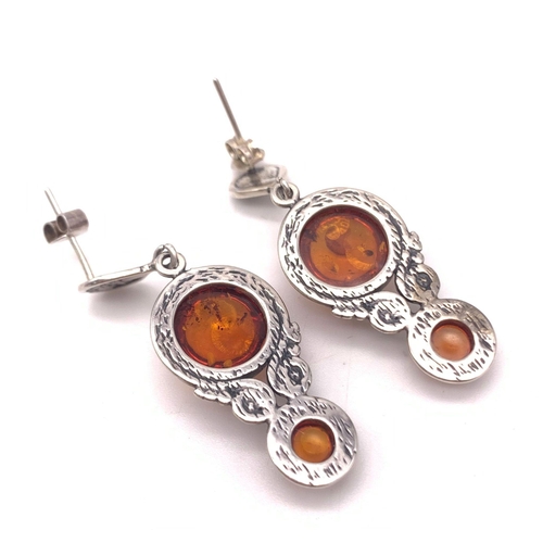 1650 - A Pair Of Silver Amber Dangler Earrings. Total Weight 7.94g