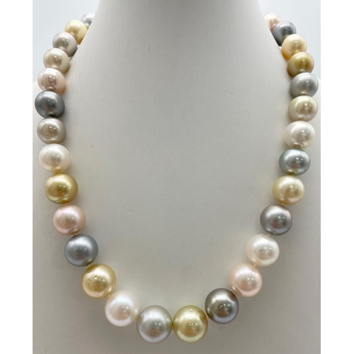 235 - A Tahitian South Sea Multicolour Pearl Necklace with a 14K Yellow Gold and Diamond Ball Clasp. Pearl... 