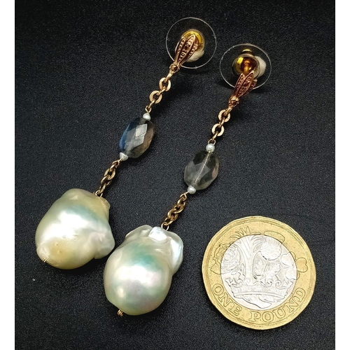 303 - A PAIR OF NATURAL PEARL DROP EARRINGS SET IN ROSE GOLD AND CRYSTAL WITH A 4cms DROP.    11,1gms