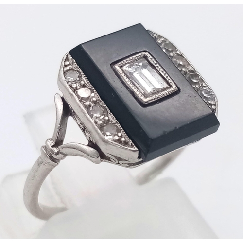 162 - A STUNNING 18K WHITE GOLD , BLACK ONYX AND DIAMOND RING . 3.7gms   size J