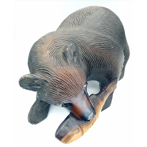 1630 - A Wooden Grizzly Bear and Unlucky Salmon Sculpture. 40cm x 25cm.