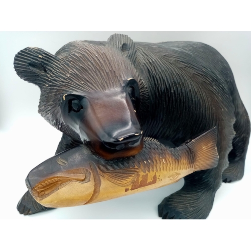 1630 - A Wooden Grizzly Bear and Unlucky Salmon Sculpture. 40cm x 25cm.