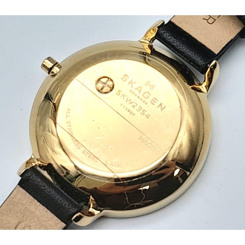 1638 - A Skagen of Denmark Quartz Ladies Watch. Blue leather strap. Gilded steel case - 34mm. Black dial wi... 