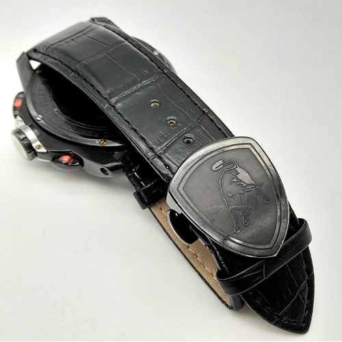 227 - A Lamborghini Chronograph Gents Watch. Black leather strap. Trillion shaped case - 50mm width. Black... 