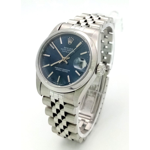 232 - A Rolex Oyster Perpetual Datejust Ladies Watch. Stainless steel bracelet and case - 31mm. Metallic b... 