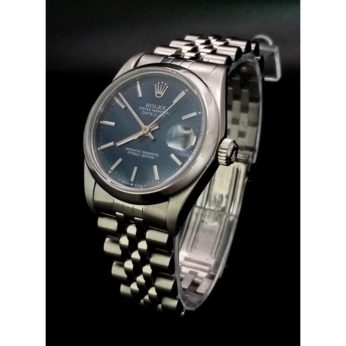 232 - A Rolex Oyster Perpetual Datejust Ladies Watch. Stainless steel bracelet and case - 31mm. Metallic b... 