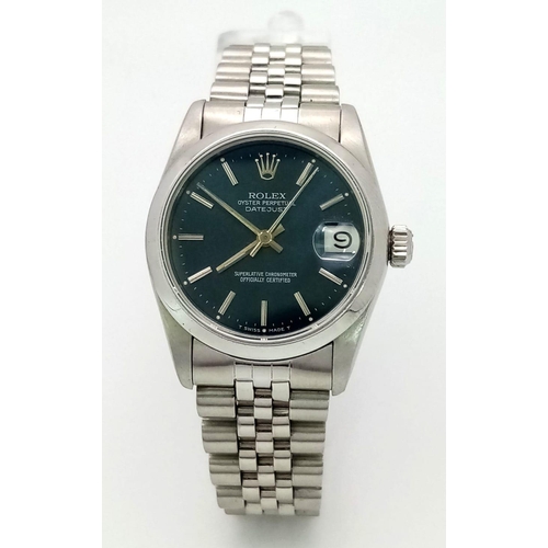 232 - A Rolex Oyster Perpetual Datejust Ladies Watch. Stainless steel bracelet and case - 31mm. Metallic b... 