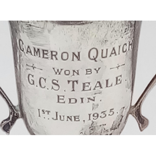 276 - THE CAMERON QUAICH SILVER CUP FROM 1ST JUNE 1935 ON PLYNTH STANDING 11cms TALL TOTAL WEIGHT 88.4gms