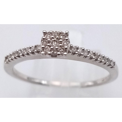 410 - 9K WHITE GOLD DIAMOND RING.  0.15CT DIAMOND. TOTAL WEIGHT 2.4G.  SIZE R