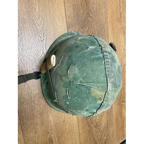 442 - A Vietnam War Era USA M1 Helmet with Foliage Band, Matches and Big Roll. Dated 1968/9. Ref: ML 144