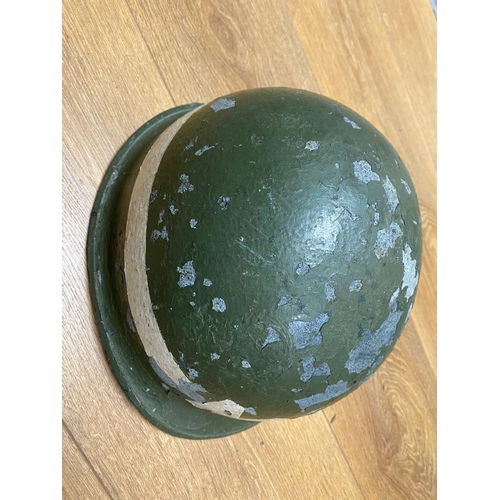 456 - A WW2 USA M1 MP Helmet. The paint is flaky from age, but the majority remains. Ref: ML145