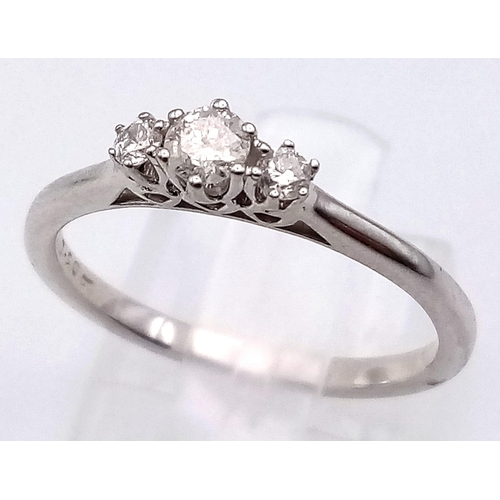 551 - 9K WHITE GOLD DIAMOND TRILOGY RING 0.20CT 2G SIZE M 1/2