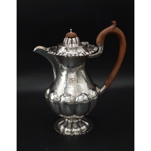 51 - An Edward VII planished silver coffee biggin, Nathan & Hayes, Chester 1909. Having a part lobed balu... 