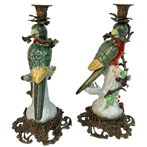 1641 - A Pair of Antique Porcelain and Bronze Parrot Candlestick Holders. Ornate brass base. Red, green and... 