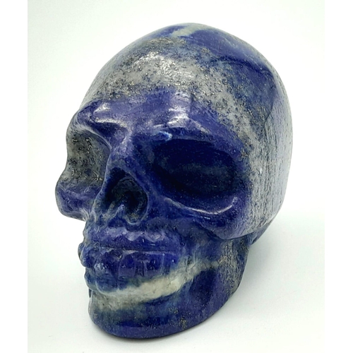 1626 - A Hand-Carved Lapis Lazuli Skull Figure. 5cm x 4cm.