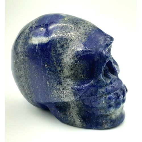 1626 - A Hand-Carved Lapis Lazuli Skull Figure. 5cm x 4cm.