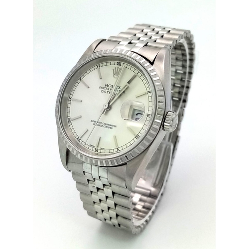 169 - A Rolex Oyster Perpetual Datejust Gents Watch. Stainless steel strap and case - 36mm. Silver-tone di... 