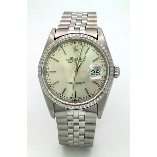 169 - A Rolex Oyster Perpetual Datejust Gents Watch. Stainless steel strap and case - 36mm. Silver-tone di... 