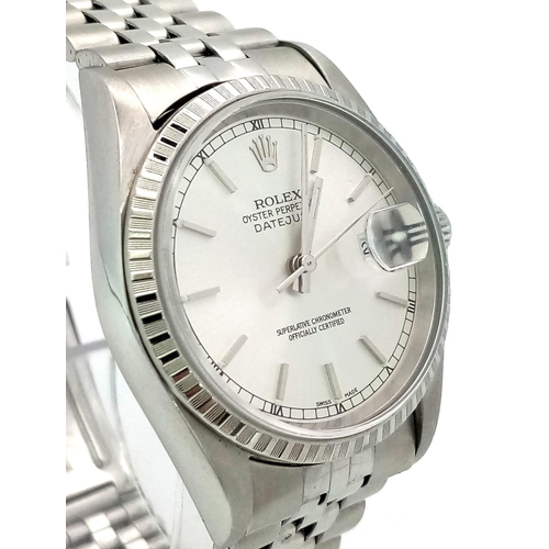 169 - A Rolex Oyster Perpetual Datejust Gents Watch. Stainless steel strap and case - 36mm. Silver-tone di... 