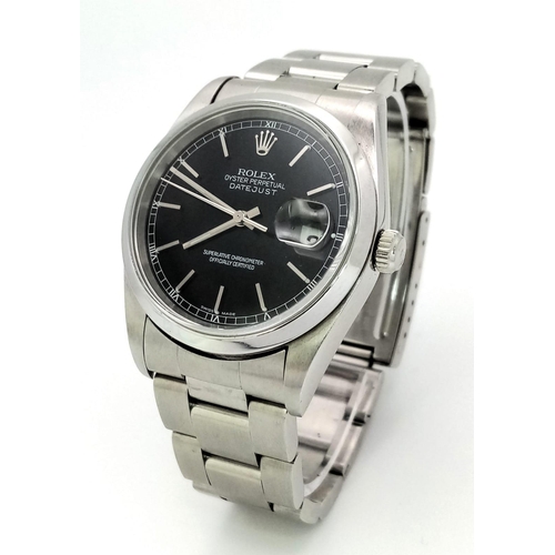 183 - A Rolex Oyster Perpetual Datejust Gents Watch. Stainless steel strap and case - 36mm. Black dial wit... 