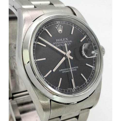 183 - A Rolex Oyster Perpetual Datejust Gents Watch. Stainless steel strap and case - 36mm. Black dial wit... 