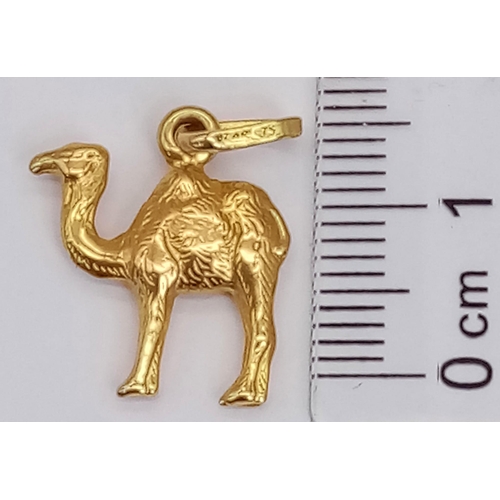 338 - AN 18K GOLD SHIP OF THE DESERT (CAMEL) CHARM .  1.5gms