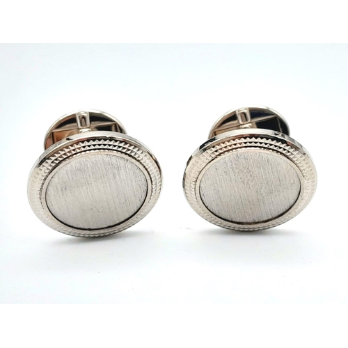 463 - A Pair of Stylish Patek Philippe 18K White Gold Cufflinks. 22.51g total weight.