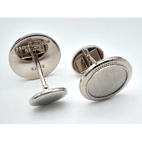 463 - A Pair of Stylish Patek Philippe 18K White Gold Cufflinks. 22.51g total weight.