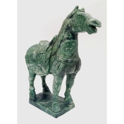 50 - A Chinese Tang Style Hand Carved Green Solid Jade Horse Figure. Stands on a jade platform. 25cm tall... 