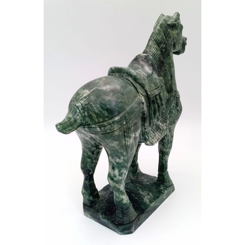 50 - A Chinese Tang Style Hand Carved Green Solid Jade Horse Figure. Stands on a jade platform. 25cm tall... 