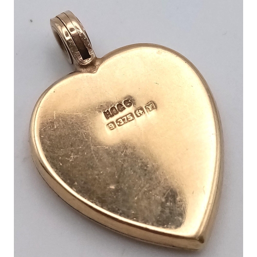 113 - A VINTAGE 9K GOLD LOCKET .   4.6gms