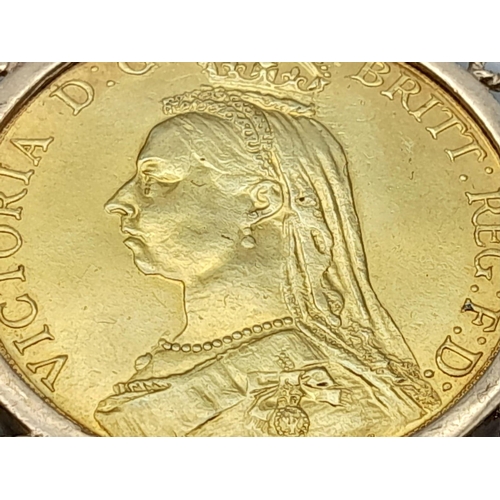 2 - A 22K GOLD DOUBLE SOVEREIGN (15.9gms) DATED 1887 AND IN VERY NICE CONDITION SET IN 9K GOLD (5.2gms).... 