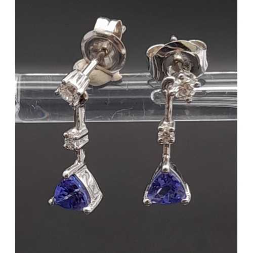 201 - 18K WHITE GOLD DIAMOND & TANZANITE SET DROP EARRINGS. TOTAL WEIGHT 1.6G