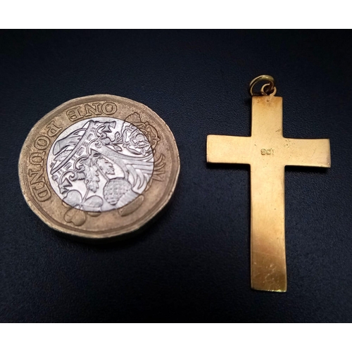 269 - A PLAIN AND TASTEFUL 9K GOLD CROSS . 1.3gms