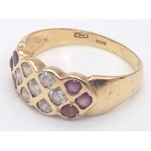 262 - An 18K Yellow Gold Ruby and White Stone Ring. Size R. 4.2g total weight.