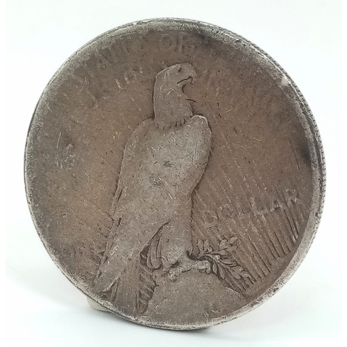 471 - A 1922 Silver one Dollar Coin. Please see photos for condition.