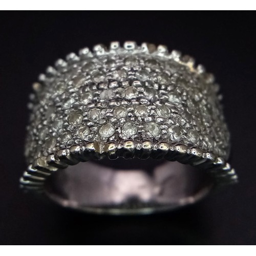 40 - 18K WHITE GOLD DIAMOND SET BAND RING.  0.75CT DIAMOND. TOTAL WEIGHT 10.1G.  SIZE M