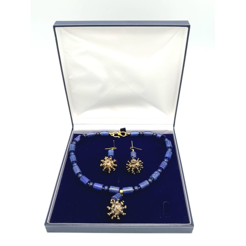 160 - Never seen before, a bronze Coronavirus and lapis lazuli necklace and earrings set, in a quality pre... 