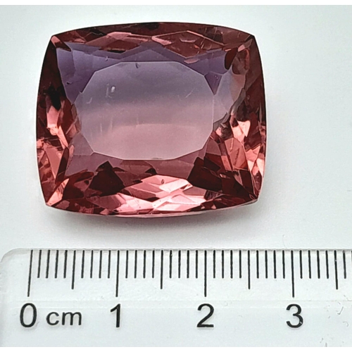 195 - A very interesting gem, a large (57.5 carats) Quartz, that has been colour enhanced to resemble Alex... 