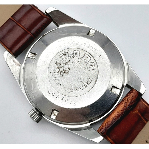 233 - A Vintage Rado Green Horse Gents Watch. Brown leather strap. Silver tone dial with date window. Auto... 