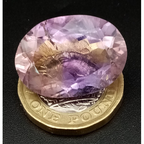 412 - A 23.18ct Faceted Ametrine in Oval Shape come with IGL&I Certification.