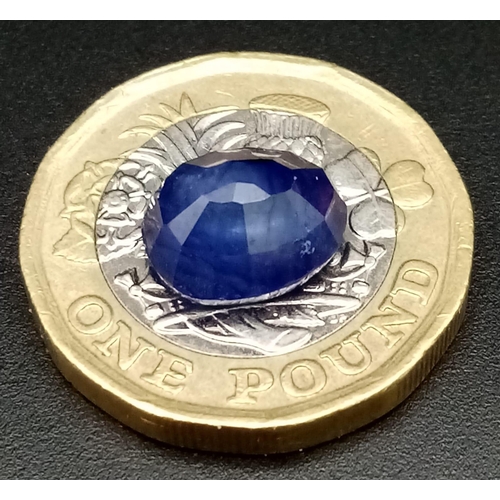 419 - A 4.96 Ct Faceted Natural African Blue Sapphire in Oval Shape. IGL&I Certified.