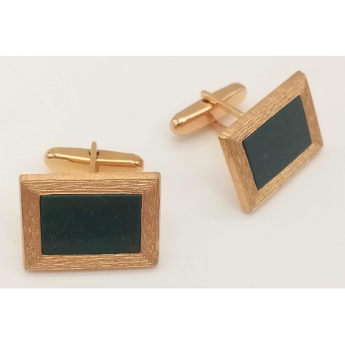 27 - A Vintage Pair of West German 9K Yellow Gold Bloodstone Cufflinks. Bark-effect surround. 8.23g total... 