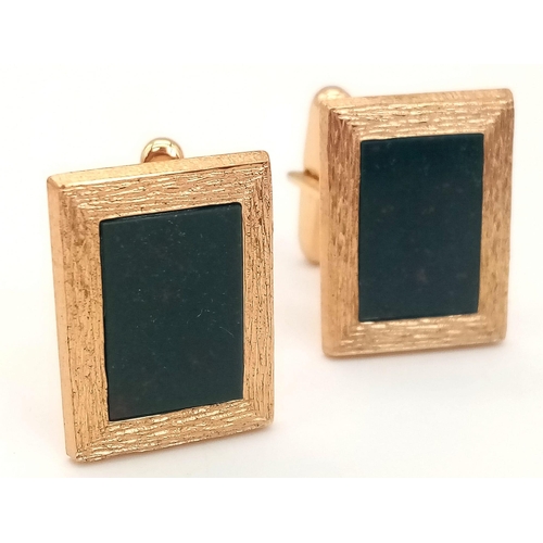 27 - A Vintage Pair of West German 9K Yellow Gold Bloodstone Cufflinks. Bark-effect surround. 8.23g total... 